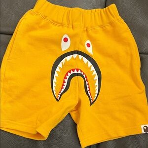 Yellow Kids BAPE Shorts with Shark Design